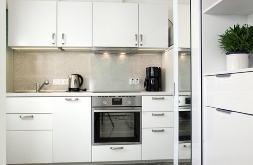 Kirchdorf Apartment | Vacation Rental, Apartment 1 in the Am Krabbenweg Building with Garden Area