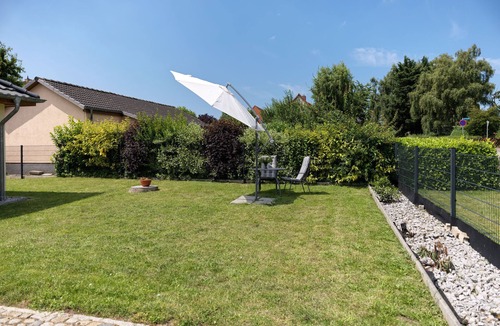 Kirchdorf Apartment | Vacation Rental, Apartment 1 in the Am Krabbenweg Building with Garden Area