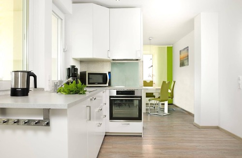 Kirchdorf Apartment | Vacation Rental, Apartment 2 in the Am Krabbenweg Building with a Large Terrace