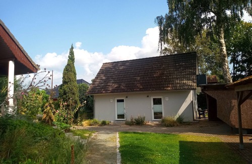 Neeberg House | Vacation apartment 2 - Achterwasser: Comfort with balcony, terrace & water view