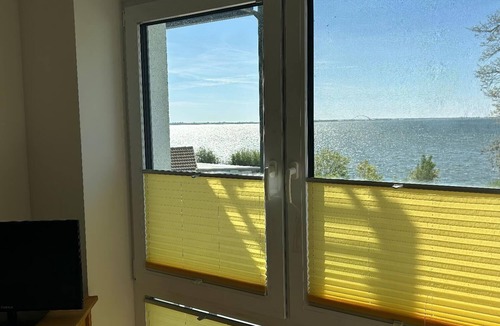 Orth Apartment | Vacation apartment - "Schöne Aussicht" with balcony and sea view directly on the waterfront