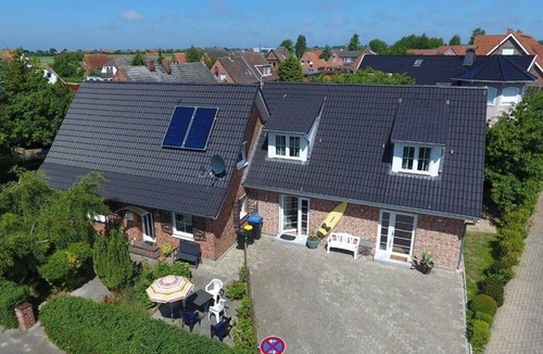 Neue Tiefe Apartment | Vacation home Aloha 1 on Fehmarn: Modern accommodation with terrace.