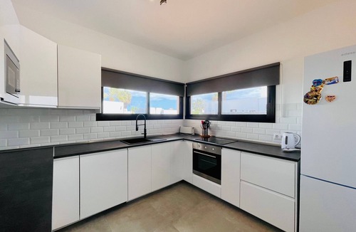 Playa Blanca House | Vacation Home 'Villa Maria' with Mountain View, Wi-Fi and Air Conditioning