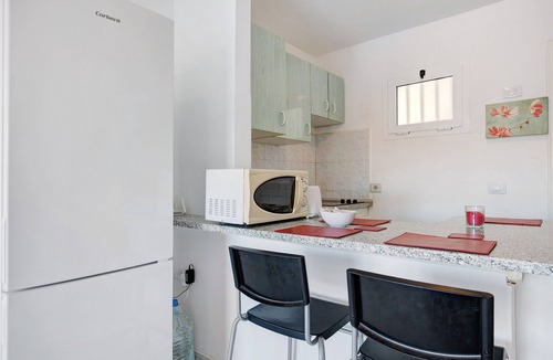 Castillo Caleta de Fuste Apartment | Vacation 'Sam' with Shared Pool, Balcony and Wi-Fi