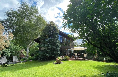 Windach Villa | Villa Kunterbunt - architect's house with charm