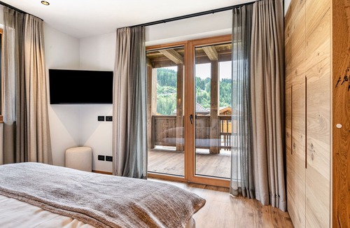 Selva di Val Gardena Apartment | Villa Sofia Apartment 'F' with Mountain View, Private Terrace and Wi-Fi
