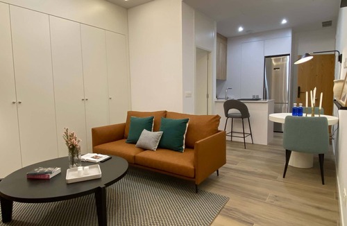 Malasana Apartment | w Warm Modern 1BR Apartment in Chueca