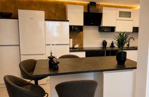 Grub am Forst Apartment | Wellness - Privat-Spa mit Whirlpool, Sauna & Kino