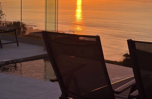 Las Cuevas Ski Chalet | White House Relaxation, Views, and an Infinity Pool