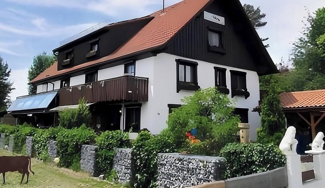 A charming guesthouse with 5 vacation apartments in a quiet location on the outskirts of town.