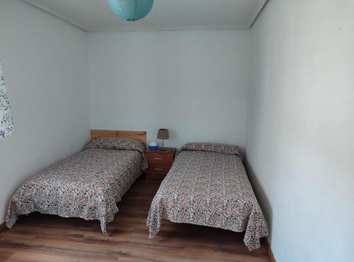 Acogedora habitación privada en piso familiar con baño compartido