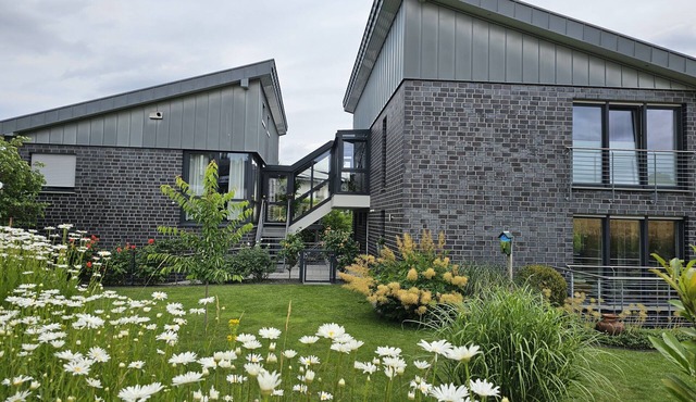 Apartment 'Am Naturpark Terra Vita' with Private Garden, Wi-Fi, and Air Conditioning