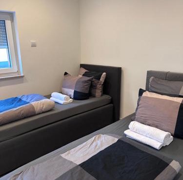 Apartment bis zu 6 Einzelbetten Stellplatz Wifi