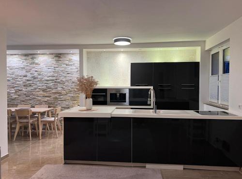 Barrierefreie Luxuswohnung mit Garten