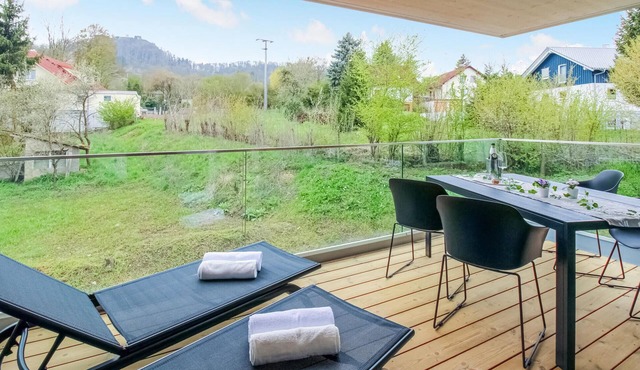 Beautiful, welcoming apartment with balcony and views of the hilly surroundings.