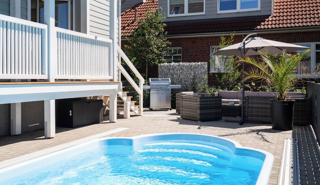 Comfortable and high-quality with heated pool and infrared sauna near the Baltic Sea