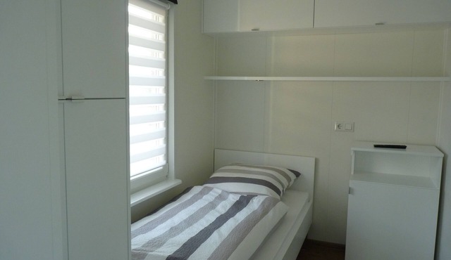 "Cozy vacation apartment by the lake - your retreat for relaxing days!"