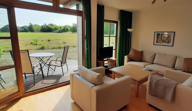 Cozy vacation apartment with terrace and rural views in Wittenbeck