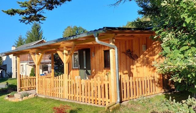 Cozy wooden cottage under the small Zschirnstein