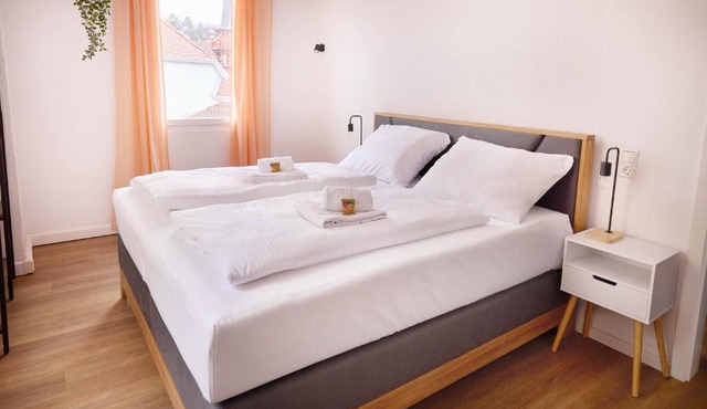 Design Apartment mit Kingsize-Betten & Balkon