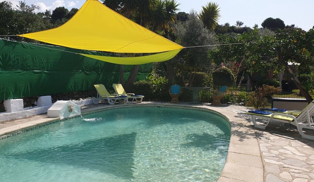 'El Nido' Peaceful holiday cottage with private pool and gardens. Dog friendly.