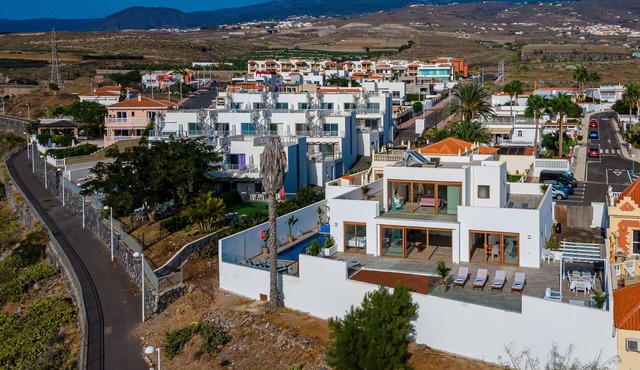 Fabulous contemporary 5 bedroom villa with private heated pool, sleeps max 13