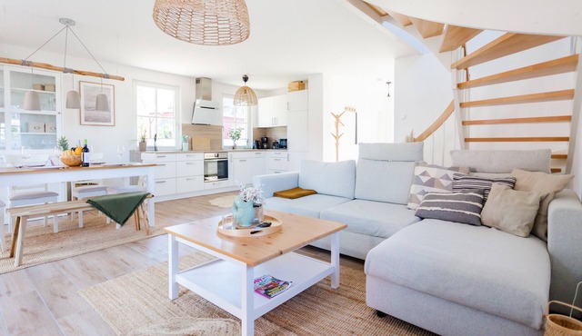 Family-friendly vacation home with modern furnishings, sauna and garden.