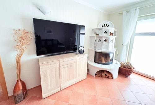 Ferienwohnung Ginster Mariendorf - mit Garten, gern mit Hund, Wintergarten