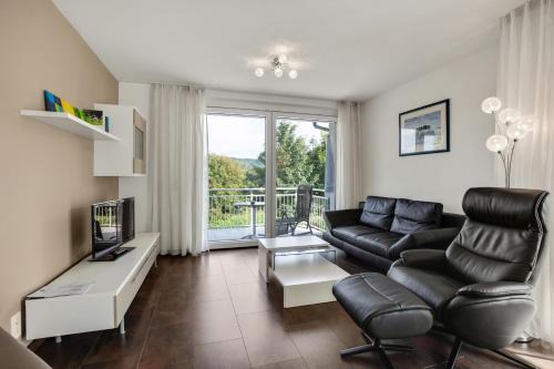 Ferienwohnung Traubenlese mit Massagesessel und Balkon