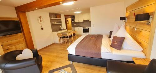 Gästehaus Holzer Kreuz - Ferienwohnung "Narzisse"