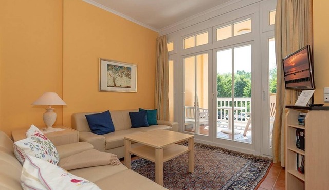 Hübsche Ferienwohnung an der Ostsee mit Südbalkon, Saunabereich & Pool im Haus!