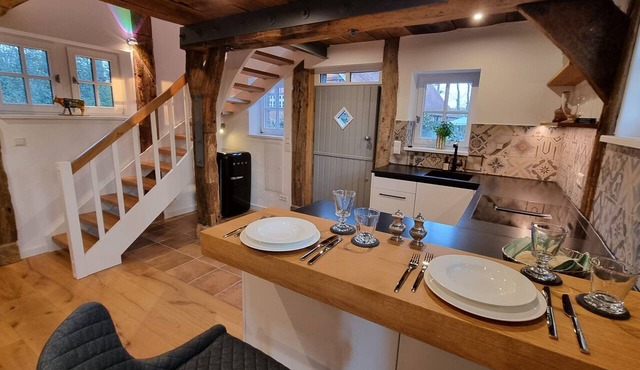 Historic Half-Timbered House Surrounded by Nature