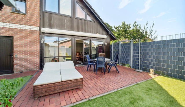 Holiday home in Wessum with terrace and barbecue
