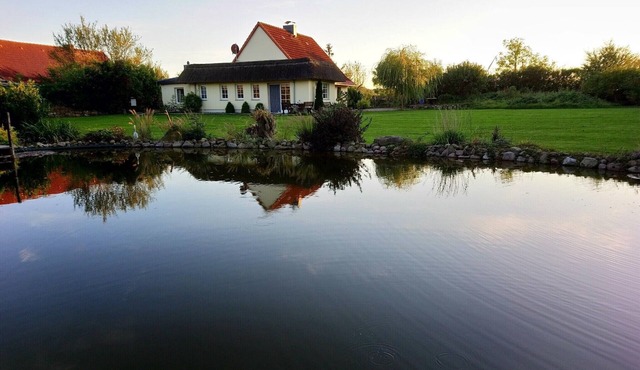 Holiday Home "Naturteich Haus" with Private Swimming Pond, Terraces, and Wi-Fi