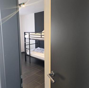HOSTEL PD23 ALTE FEUERWACHE I 3min CityHospital I 50m Supermarkt I SmartTV I P I Gemeinschaftsküche I Monteure I Kurzurlaub