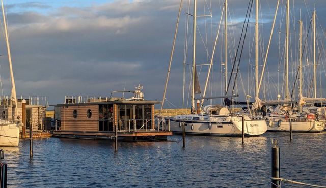 Houseboat Fjord Stella with bio sauna and roof terrace in Wendtorf/Kiel Fjord