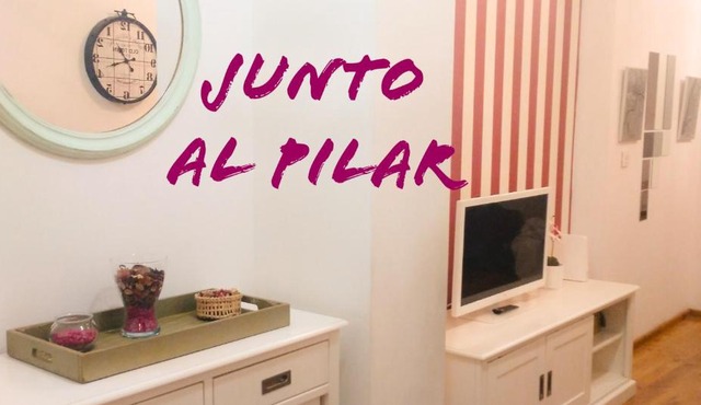 JUNTO AL PILAR