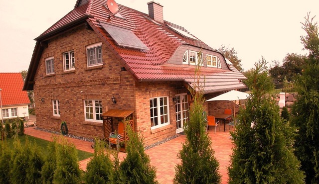 Large luxury cottage with four bedrooms, four granite - baths and sauna