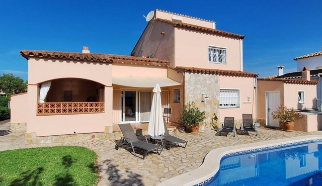 Large vacation home right on the beach with pool and garden