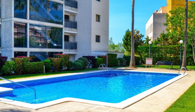 Lovely apartment for 4 guests with A/C, pool, WIFI, TV and balcony