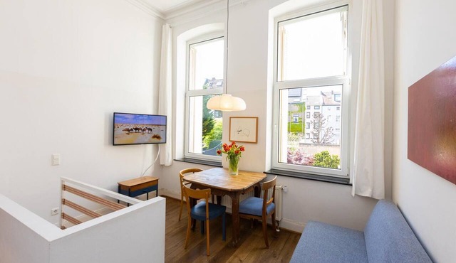 Maisonette with sunny balcony facing the quiet garden courtyard