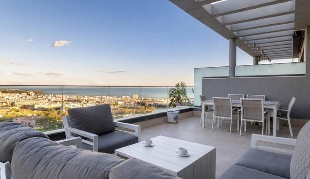 Modern 3 bedroom penthouse with mountain and sea views.