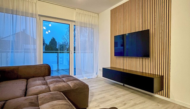 Modern apartment with balcony - near Kurpark & trade fair