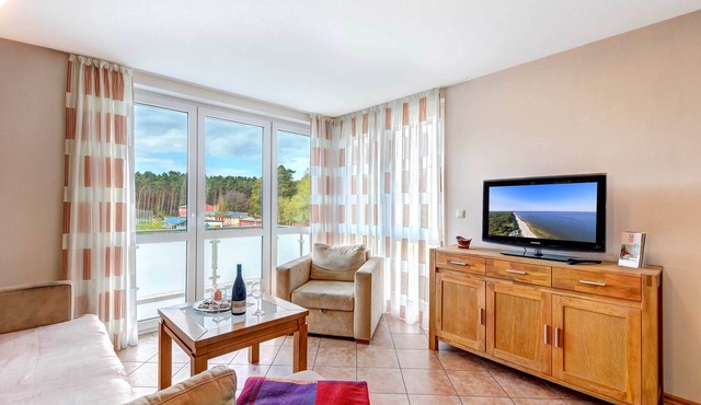 Modern apartment with balcony - only 800 m to the beach