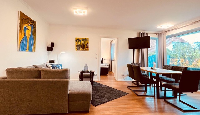 Modern ground-floor holiday apartment with terrace and garden view in Börgerende