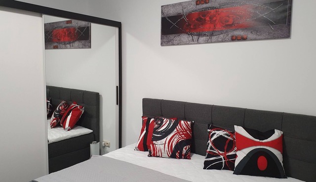 Modern vacation apartment with balcony directly on the Peene