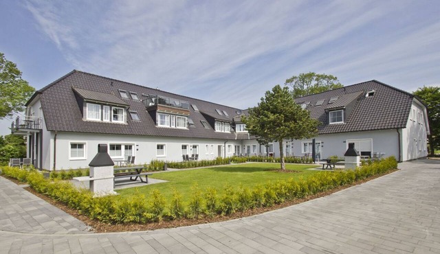 Modern vacation apartment with private terrace - Haus Inselwind FeWo MEERküste -