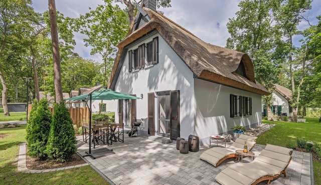 Modern vacation home in fishing village with sauna & garden - rural and quiet on U