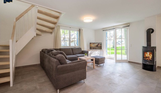 Modern vacation home in the fishing village with sauna & fireplace - in the middle of nature, close to