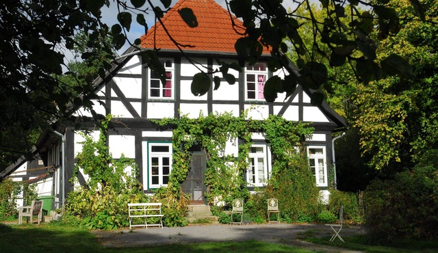 Old forester's house at Ippenburg Castle, surrounded by a large garden
